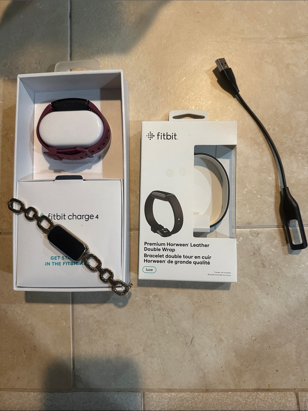 fitbit Charge 4 with Plum Silicone Band and Silver Chain Bracelet